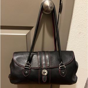 Black Leather Cole Haan medium sized purse. Soft leather and roomy inside.